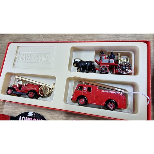 12 - Boxed as new London's fire engines diecast vehicles set by Lledo along with 2 other boxed diecast ve... 