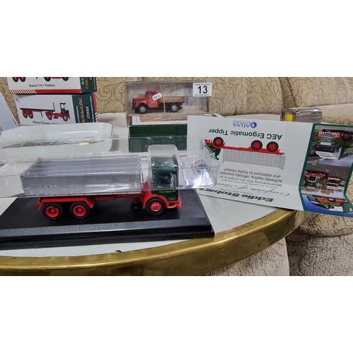 13 - Quantity of diecast vehicles inc 3x Eddie Stobart lorries 2 other diecast vehicles and a porcelain d... 