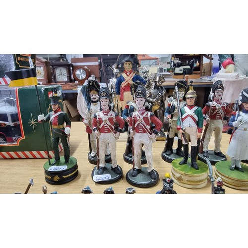 23 - Quantity of 16x various soldier figures inc 8 which are metal all by the same maker, along with 8 re... 