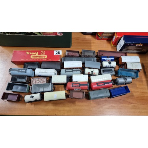 28 - Large quantity of OO gauge rolling stock with various advertising in good condition