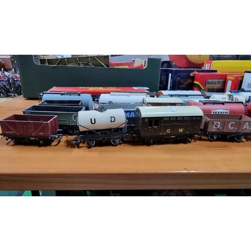 28 - Large quantity of OO gauge rolling stock with various advertising in good condition