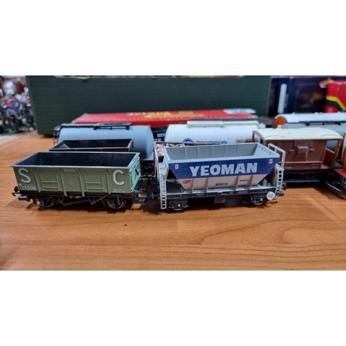 28 - Large quantity of OO gauge rolling stock with various advertising in good condition