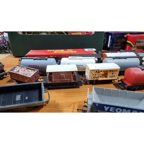 28 - Large quantity of OO gauge rolling stock with various advertising in good condition