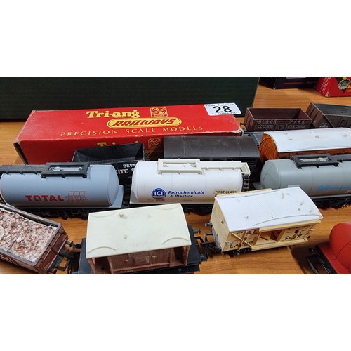 28 - Large quantity of OO gauge rolling stock with various advertising in good condition