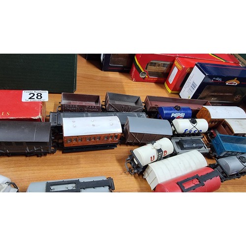 28 - Large quantity of OO gauge rolling stock with various advertising in good condition