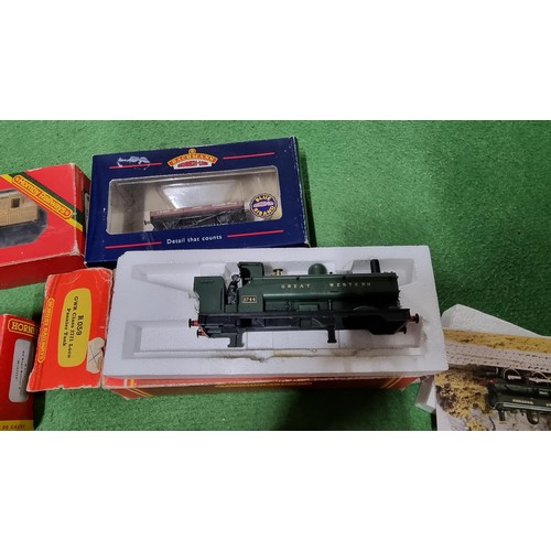 30 - Quantity of boxed OO gauge rolling stock and coaches inc a GWR pannier tank body makers Hornby Bachm... 