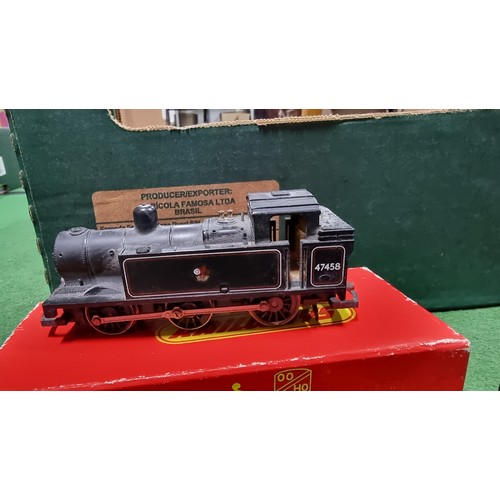 34 - Large quantity of OO gauge rolling stock inc to locomotives a black loco 47458 and a blue diesel loc... 