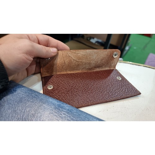 36 - Large quantity of vintage leather wallets and purses all in excellent looked after clean condition