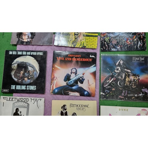 42 - Quantity of vinyl records inc heavy metal and rock bands inc Iron Maiden Rolling Stones, Alice Coope... 