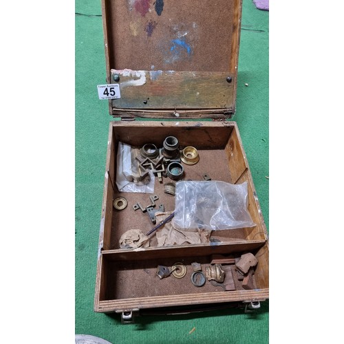 45 - Art box containing a large quantity of various clock and furniture parts and mounts inc a large quan... 