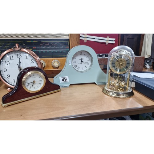 49 - Quantity of 6 various clocks inc an attractive copper clock