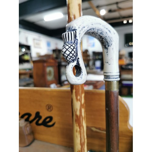 61 - Rustic wooden hiking stick along with a shepherds crook walking stick with a thistle design crook ha... 