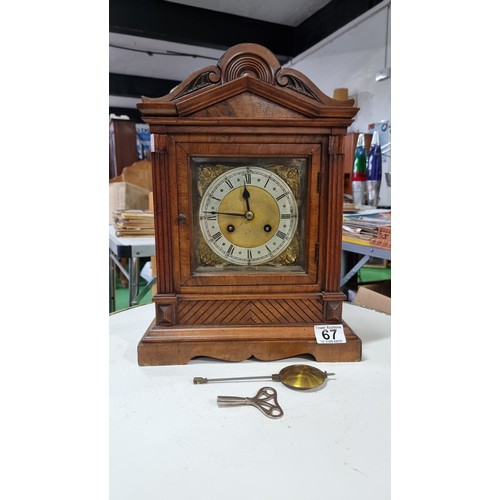 67 - Good quality antique walnut cased mantel clock of large proportions with a brass and silvered chapte... 