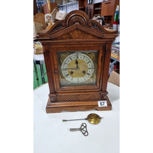 67 - Good quality antique walnut cased mantel clock of large proportions with a brass and silvered chapte... 