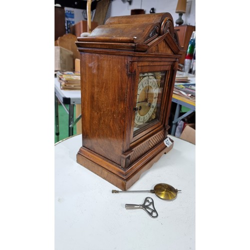 67 - Good quality antique walnut cased mantel clock of large proportions with a brass and silvered chapte... 