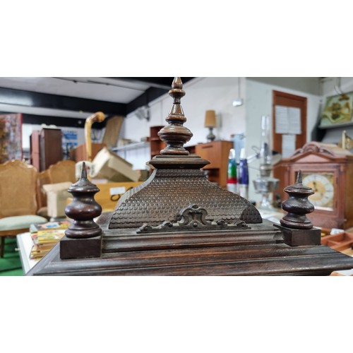 68 - Antique black forest 14 day strike german mantel clock by H.A.C. with three carved spindles in good ... 