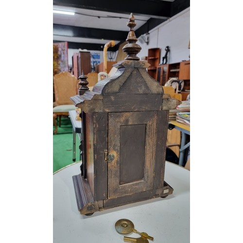 68 - Antique black forest 14 day strike german mantel clock by H.A.C. with three carved spindles in good ... 