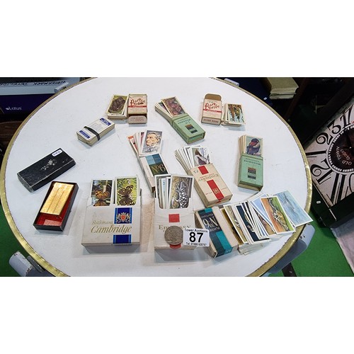 87 - Large quantity of various cigarette boxes all containing complete sets of cigarettes cards along wit... 