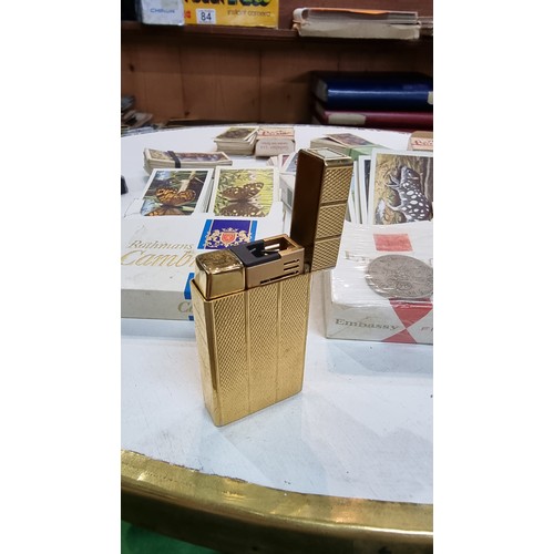 87 - Large quantity of various cigarette boxes all containing complete sets of cigarettes cards along wit... 