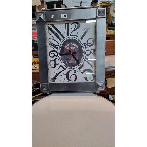 99 - Metal frame wall clock with a metal rail to the top and bottom in good clean condition has height 59... 