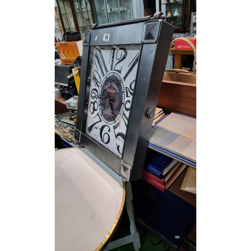 99 - Metal frame wall clock with a metal rail to the top and bottom in good clean condition has height 59... 