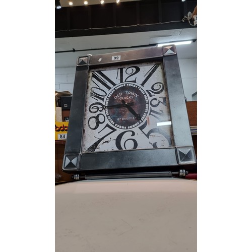 99 - Metal frame wall clock with a metal rail to the top and bottom in good clean condition has height 59... 