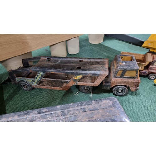 107 - Quantity of large metal Tonka trucks inc a dumper truck in good condition largest truck has a height... 