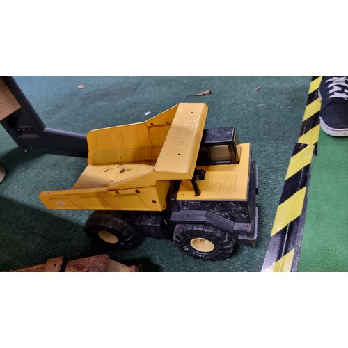 107 - Quantity of large metal Tonka trucks inc a dumper truck in good condition largest truck has a height... 