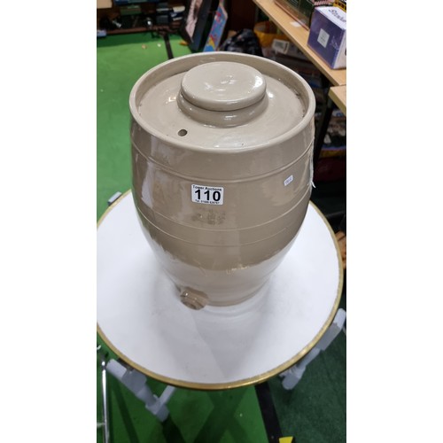 110 - Large stoneware barrel with a lid to the top and its original sticker attached for C White, all in e... 