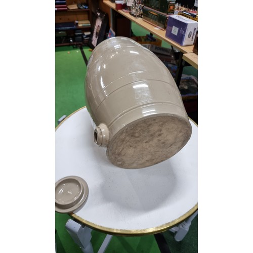 110 - Large stoneware barrel with a lid to the top and its original sticker attached for C White, all in e... 