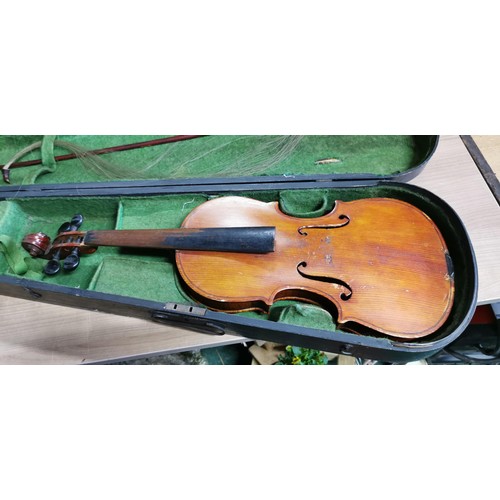 176 - 2x antique violins in need of restoration comes with 2x violin cases. 1x appears to be an early Gibs... 