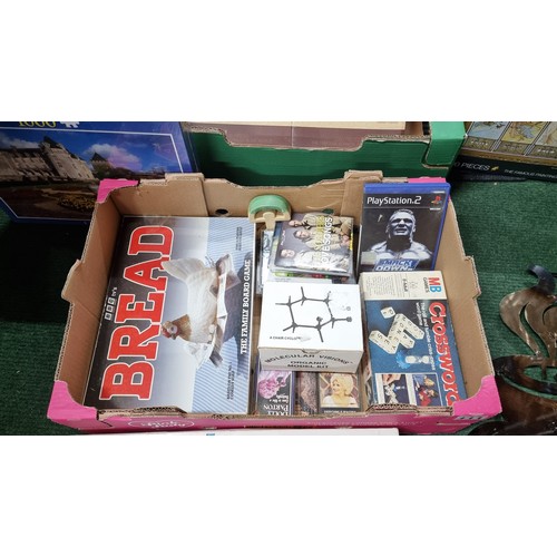 111 - A box full of new and sealed puzzles 8x in total inc a 3000 piece puzzle along with a box of various... 