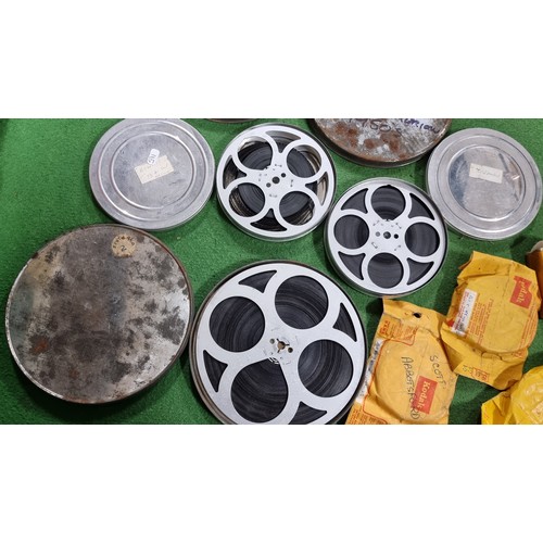 116 - Large job lot of vintage 8mm film reels in metal tins and plastic cases of various types and subject... 