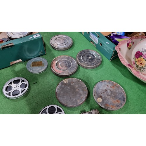 116 - Large job lot of vintage 8mm film reels in metal tins and plastic cases of various types and subject... 