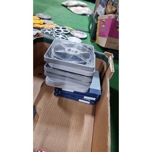 116 - Large job lot of vintage 8mm film reels in metal tins and plastic cases of various types and subject... 