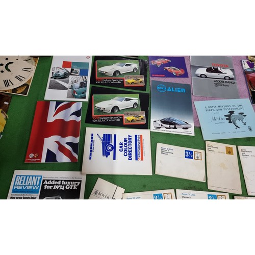 124 - Very large collection of automobilia ephemera to inc a large quantity of vintage car manuals and sal... 