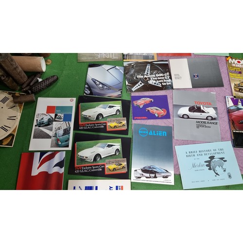 124 - Very large collection of automobilia ephemera to inc a large quantity of vintage car manuals and sal... 