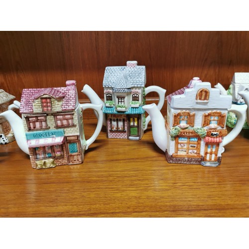 231 - Large qty of various collectable ceramic cottage teapots some are by Leonardo