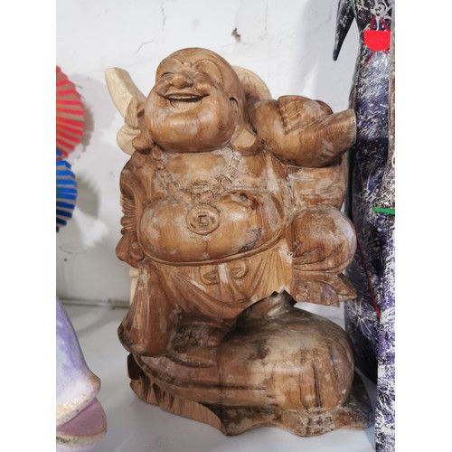 233 - Qty of various hand carved & painted wooden figures inc. a laughing buddha, ethnic lady figures, fis... 