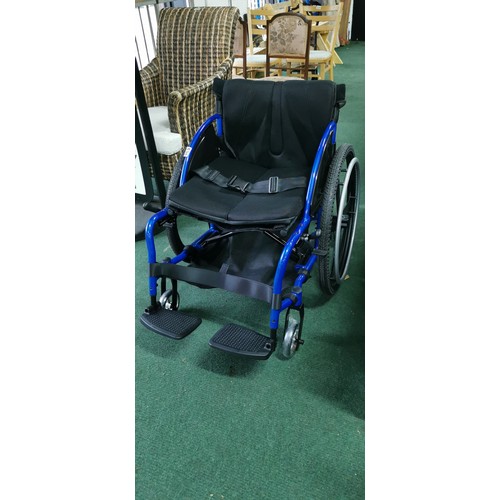 536 - Foldable wheelchair in near mint condition never used when bought by vendor and stored. A none push ... 