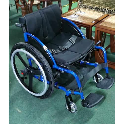 536 - Foldable wheelchair in near mint condition never used when bought by vendor and stored. A none push ... 