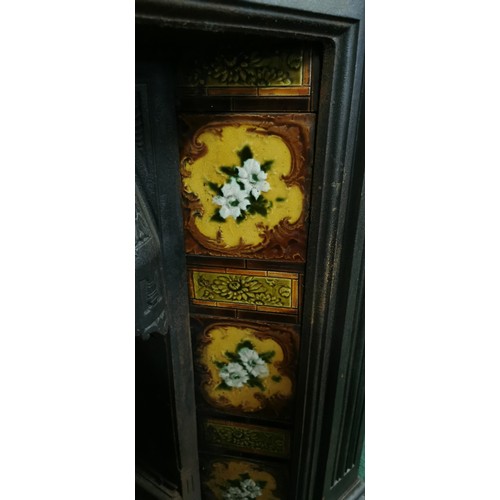 537 - Victorian cast iron fireplace with interesting tiling all in good order.
117cm high
103 wide
19cm de... 