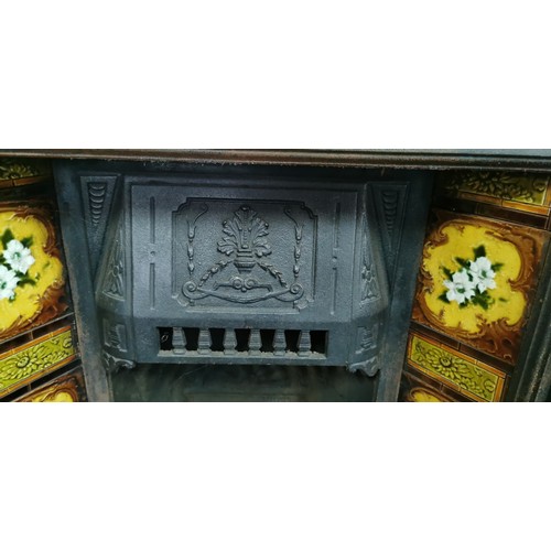 537 - Victorian cast iron fireplace with interesting tiling all in good order.
117cm high
103 wide
19cm de... 