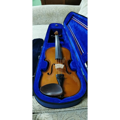 57A - Stentor Student I violin 4/4 used just once in its original carry case. 
Comes with 2 bows & tin of ... 