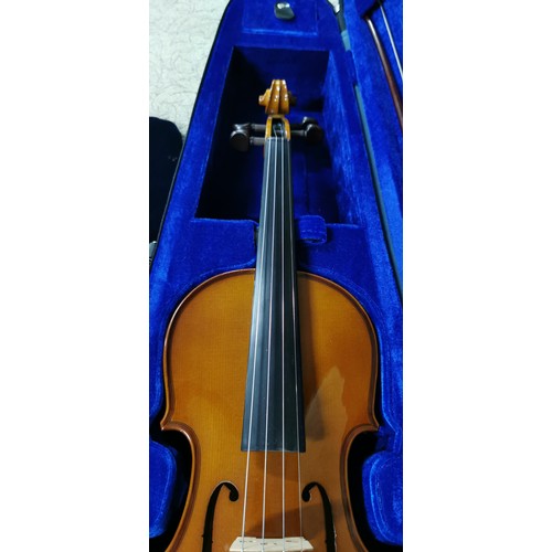 57A - Stentor Student I violin 4/4 used just once in its original carry case. 
Comes with 2 bows & tin of ... 