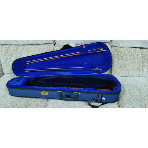 57A - Stentor Student I violin 4/4 used just once in its original carry case. 
Comes with 2 bows & tin of ... 