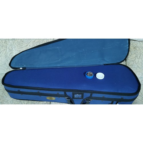 57A - Stentor Student I violin 4/4 used just once in its original carry case. 
Comes with 2 bows & tin of ... 