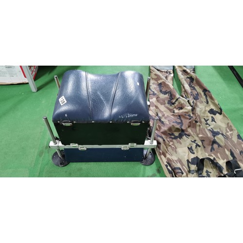 61A - Fishing seat box with leather top & octopus legs with fishing equipment & accessories. Comes along w... 