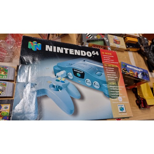 9 - Boxed Nintendo 64 games console complete inc controller along with one other boxed controller and 6x... 