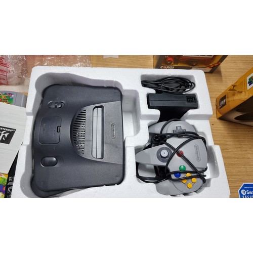 9 - Boxed Nintendo 64 games console complete inc controller along with one other boxed controller and 6x... 